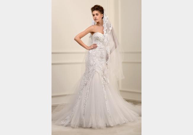 بالصور انجلينا جولي تختار مصمم لبناني لفستان زفافها 2013