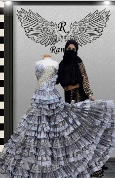 بالصور سعودية تصمم فستاناً من النقود مستخدمة مليون ريال - صور فستان مصمم باستخدام مليون ريال