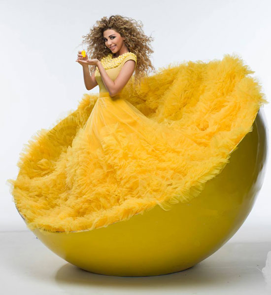 صور ميريام فارس بفستان اصفر غريب