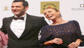 صور الممثل التركي مراد يلدريم (أمير) مع زوجتة في مهرجان دبي السينمائي 2013