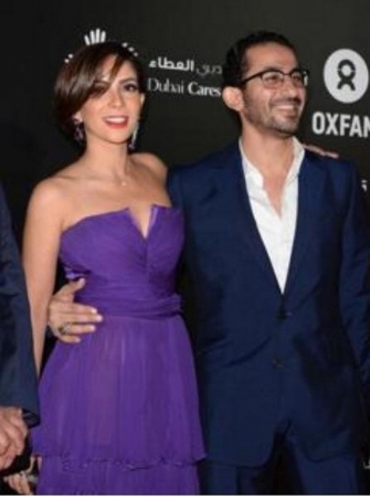 صور منى زكي بفستان مكشوف الصدر مع زوجها احمد حلمي في مهرجان دبي السينمائي 2013