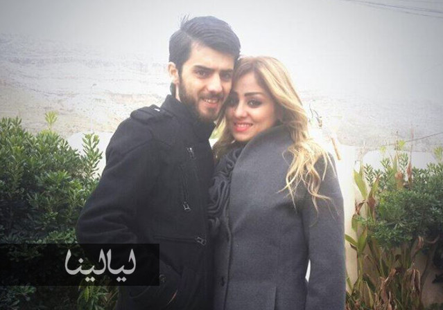 صور رومانسية تجمع برواس حسين مع زوجها وسط الثلوج 2014
