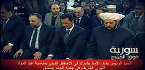 صورة الرئيس بشار الاسد في المسجد للاحتفال بذكرى المولد النبوي 2014