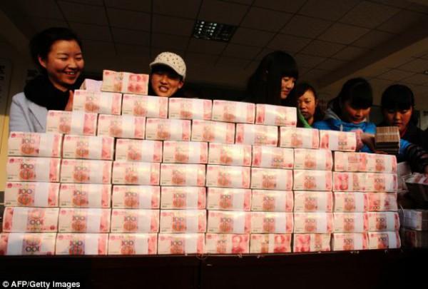 شاهد بالصور سور الصين العظيم مصنوع من النقود , صور سور الصين العظيم الجديد