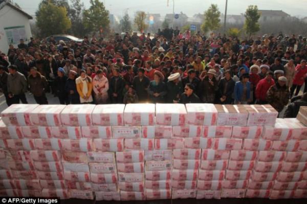 شاهد بالصور سور الصين العظيم مصنوع من النقود , صور سور الصين العظيم الجديد