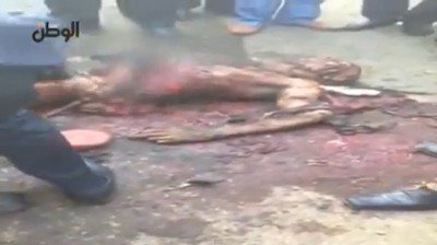 بالفيديو شاهد جثة الانتحاري الذي فجر مبنى مديرية أمن القاهرة اليوم 24/1/2014