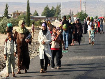 ارتفاع عدد اللاجئين السوريين بالأردن إلى 587 ألفا 2014