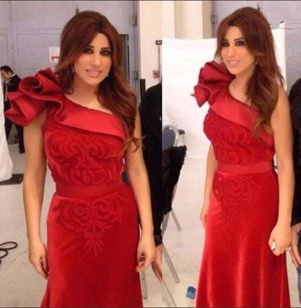 صور نجوى كرم بفستان أحمر انيق في حفل زفاف في الإمارات 2014
