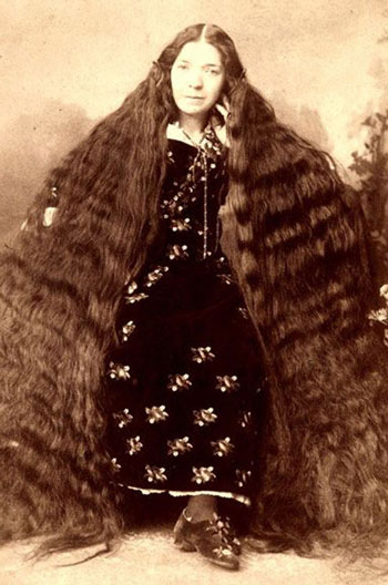 صور الأخوات ساذرلاند صاحبات أطول شعر في العالم