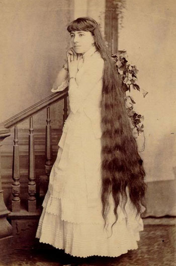 صور الأخوات ساذرلاند صاحبات أطول شعر في العالم