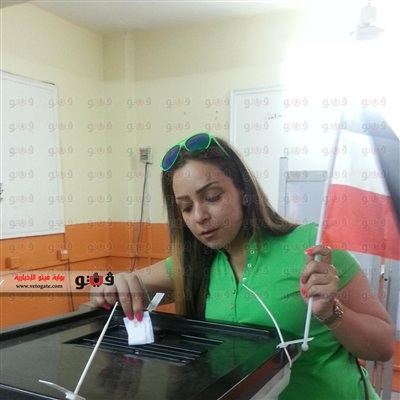 صور ريم البارودي وهي تدلي بصوتها في الانتخابات الرئاسية 2014