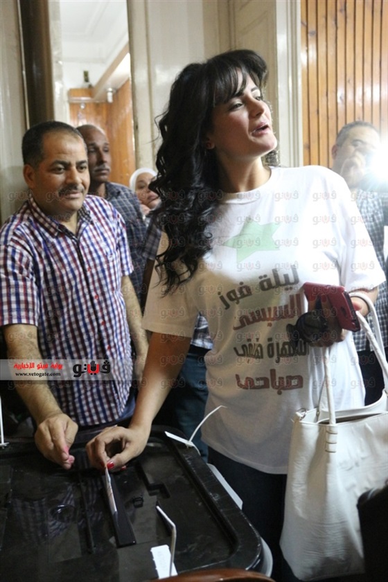 صور سما المصري وهي تدلي بصوتها في الانتخابات الرئاسية 2014