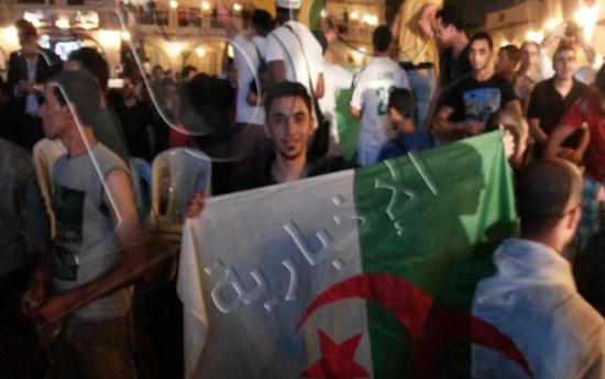 صور فرحة الجماهير العربية والجزائرية بتأهل الجزائر للدور الثاني من كأس العالم 2014