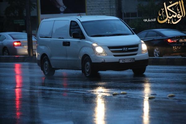 صور تساقط الأمطار في عمان اليوم الاحد 19/10/2014