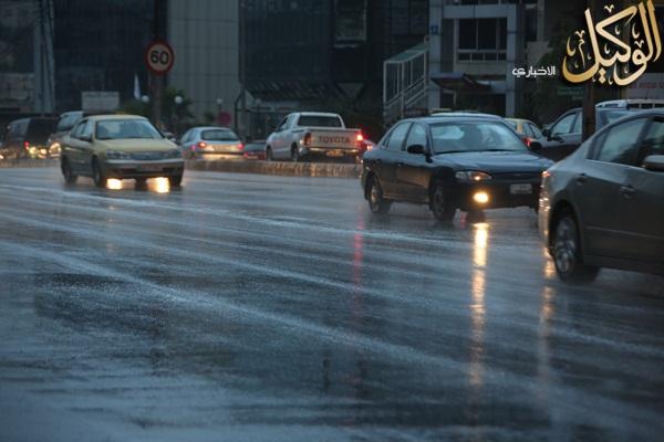 صور تساقط الأمطار في عمان اليوم الاحد 19/10/2014