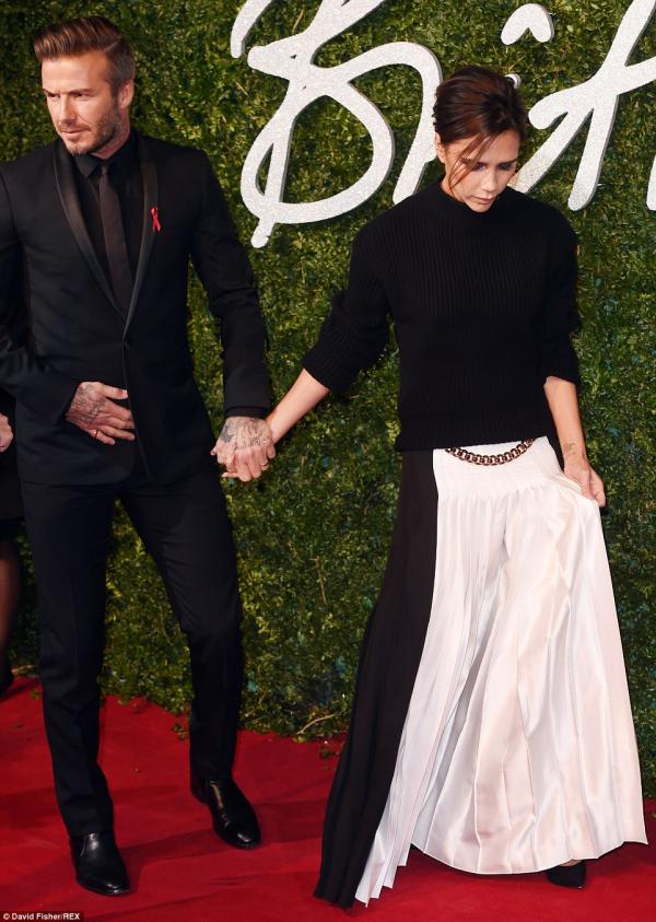 صور ديفيد بيكهام وزوجته فيكتوريا في حفل British Film Awards بلندن 2014