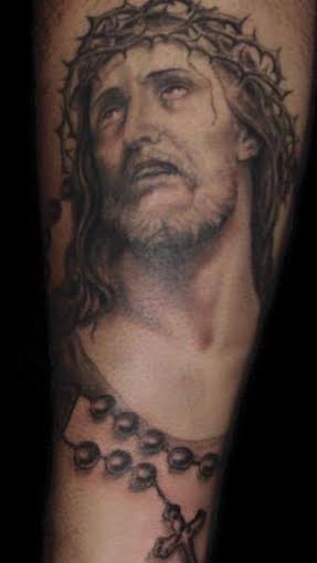 بالصور تاتو وجه السيد المسيح على ذراع ميسي 2015