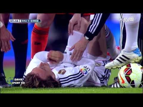بالفيديو لحظة اصابة لوكا مودريتش في مباراة ملقا 2015