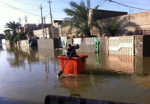 صور أمطار العراق 2013 - بغداد تغرق في بحيرات من مياه الامطار التي  لم يشهد لها مثيل منذ اكثر من 30 سنة